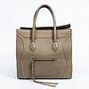 Celine Phantom Handbag, in dune grained calf leather with metal brass hardware, opening to a olive green suede lined interior with a side zipper pocke