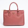 Prada Galleria Zip Handbag, in pink Saffiano lux calf leather with gold hardware, opening to a hot pink Prada monogrammed interior with two large zip 