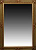 French Style Polychromed Gilt and Gesso Overmantel Mirror, 20th c., the cove molded frame with relief scrolled decoration around a rectangular plate, 