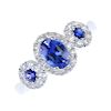 * A sapphire and diamond triple cluster ring. The three oval and circular-shape sapphires, each with