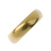 An 18ct gold band ring. Hallmarks for Birmingham, 1971. Width 6mms. Weight 7gms. <br><br>Overall con