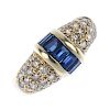 A sapphire and diamond dress ring. The rectangular-shape sapphire line, with bar sides, to the pave-