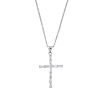A diamond cross pendant. The tapered baguette-cut diamond, with brilliant-cut diamond accent, to the