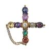 A mid 19th century gold multi-gem cross brooch, circa 1840. Designed as two crossed lines of various