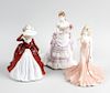 A group of Doulton, Coalport and Worcester figures. Comprising four Coalport ladies, including 'Ladi