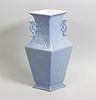A Chinese porcelain vase. Of lozenge form with waisted neck having applied pierced twin handles, dec