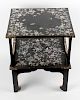 A fine Japanese mother-of-pearl and abalone inlaid black lacquered table. The square top decorated w