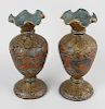 A pair of Persian papier mache vases. Each of ovoid form having exaggerated frilled rim, decorated t