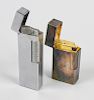 Two lighters. The first a Vinci silver plated example, the other a Calibri Duo-Flame, each in fitted