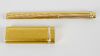 A gold plated Cartier ballpoint pen. Of oblong form having brushed surface to the whole and with gre