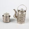 Two Chinese trade silver or white metal miniature items. Comprising: a cylindrical teapot with relie