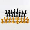 A Victorian Jacques 'Staunton Chess-Men' boxwood and ebony chess set.One of each rook with red crown