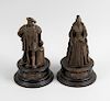 Two bronzed copper figures, modelled as Henry VIII, Queen Elizabeth I, he resting his hand upon armo