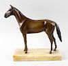 A bronze figure of a racehorse. Modelled wearing bridle and stood upon rectangular marble plinth, 10