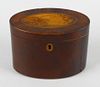 A George III inlaid mahogany oval tea caddy, the hinged cover with harewood and stained lime wood hu