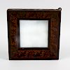 A Victorian Tunbridgeware inlaid wall mirror. The plain square mirror plate within canted surround d