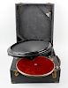A portable gramophone with Phonos speaker / playing head system, a 19th century rectangular box with