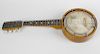 A cased eight-string banjo. The plain stained-wood body having ivorine tuners, unmarked 21 (53.5 cm)