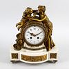 An early to mid 19th century French ormolu and white marble mantel clock.Samuel Marti, Paris.Having