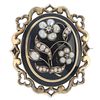 A mid Victorian gold, enamel, split pearl and diamond memorial brooch. The central black enamel oval
