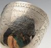 A Victorian silver goblet engraved with floral swags and presentation inscription. Hallmarked H J Li