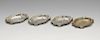 A 1930's set of four silver ashtrays of oval form with scalloped surround. Hallmarked John Collard V