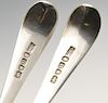 A pair of George III Old English pattern silver table spoons with initialled terminal and extended d