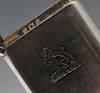 An Edwardian silver vesta case of plain oblong form with engraved family crest to the front, hallmar