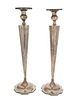 A pair of weighted sterling silver candlesticks
