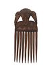 A West African carved wood comb