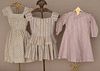 THREE CHILDREN'S CALICO DRESSES, 1850-1860