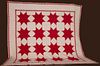 RED FEATHERED-STAR PIECED QUILT, 19TH C