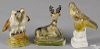 Three pieces of Pennsylvania chalkware, 19th c., to include a songbird, a stag, and love birds