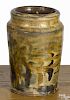 American redware jar, 19th c., probably Ohio, with a marbleized glaze, 6 3/4'' h.