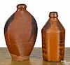 Pennsylvania redware flask and bottle, 19th c., with manganese splash decoration, 7 3/4'' h.