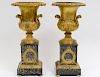 PAIR OF EMPIRE STYLE GILT BRONZE AND MARBLE URNS