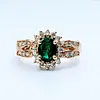 Classic Emerald & Diamond Halo Ring