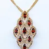 Stylish Marquise Garnet and Diamond Pendant