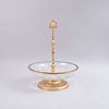 Centro de mesa. SXX. Elaborado en vidrio y metal dorado. Decorado con motivos vegetales y orgánicos. 47 cm de altura.