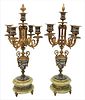 Pair of French Bronze Candelabras, having four arms on enameled urn form stem, resting on ormolu mounted onyx base, height 19 inches.