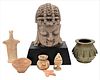 Group of Eastern Items, to include clay miniature pots, carved sandstone bust, and a heavy brass pot with incised figures and designs.