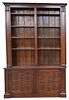 Large Mahogany Classical Bookcase, having two door bottom with shelf top, height 103 inches, width 68 inches, depth 17 inches.