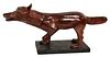 Large Bronze Sculpture, fox in stalking pose with one foot up, Metropolitan Galleries copy, height 22 inches, length 48 inches, width 13 inches.