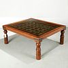 Indian carved iron studded teakwood coffee table