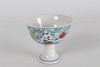 A Chinese Porcelain Fortune Cup