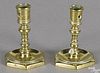 Pair of brass octagonal base taperstick holders, early 18th c., 2 5/8'' h.