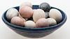 4058154: Unsigned, Attributed to Clifford West, Ceramic
 Bowl with 18 Stone Eggs E8RDF