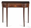 Federal mahogany card table, ca. 1800, with a concave front, with line and diamond inlays