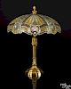 Gorham gilt bronze table lamp with a leaded glass shade, unmarked, 27 1/2'' h., 21'' dia.