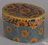Small wallpaper dresser box, 19th c., with orange decoration on a blue ground, 2'' h., 3'' w.